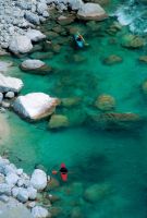 Kayaking on clear Soca river